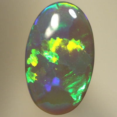 SOLID SEMI BLACK OPAL Very bright rolling flashes of neon green, orange, and purple. SEE VIDEO